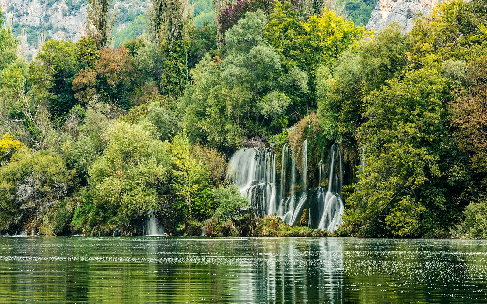 Roski Slap waterfall cascading over rocks at Krka National Park, Croatia.