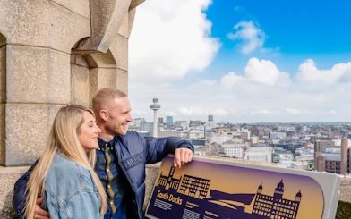 Guests enjoying the view from the Royal Liver Building in Liverpool.