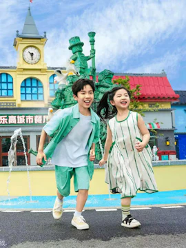 Children running near LEGO sculptures at LEGOLAND® Shanghai Resort.