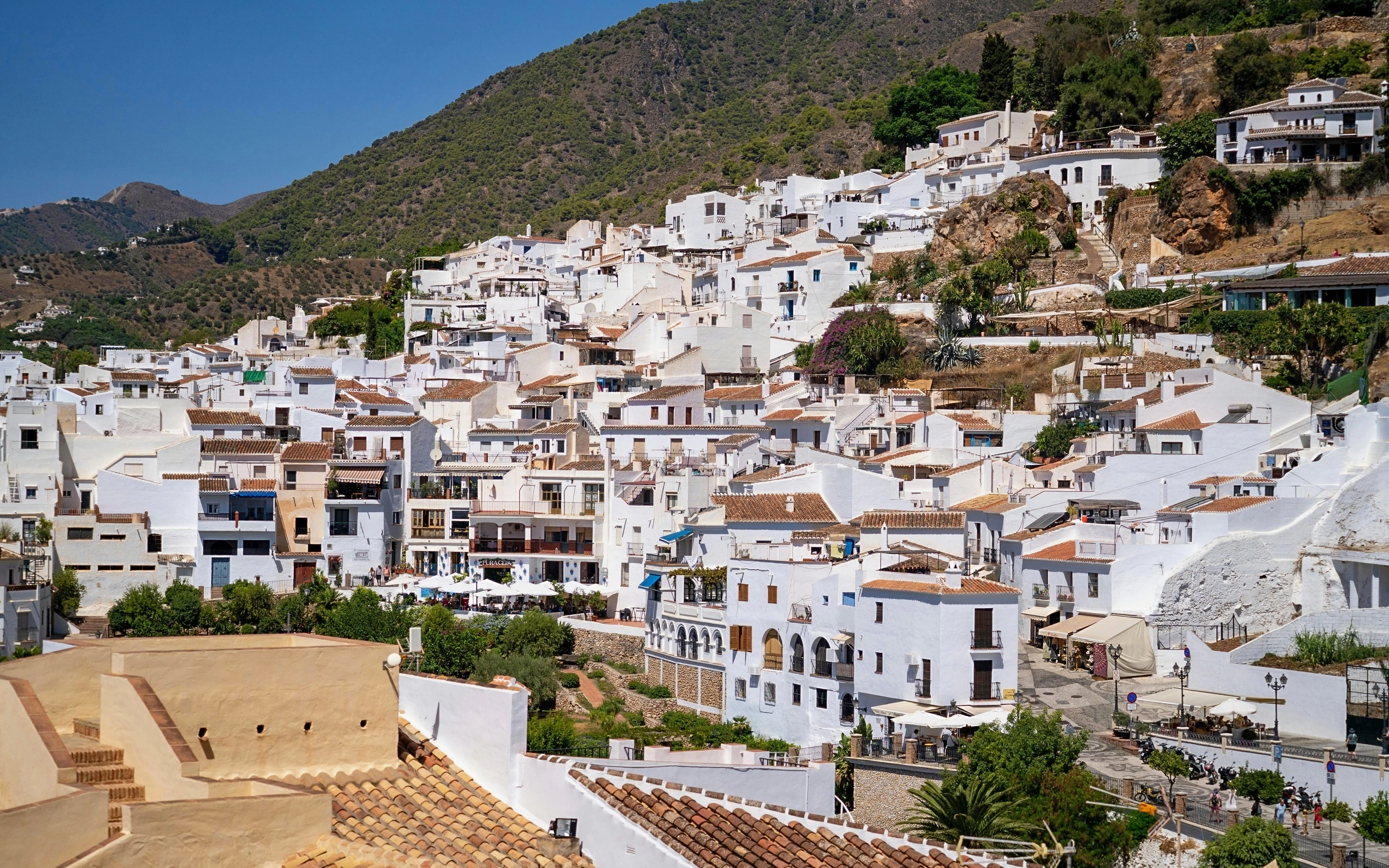 Whitewashed buildings in the hillside village of Frigiliana, Spain.