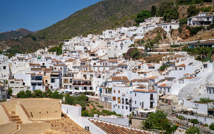 Whitewashed buildings in the hillside village of Frigiliana, Spain.