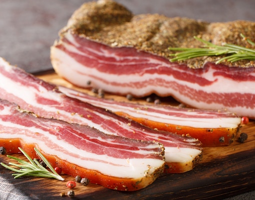 Guanciale pasta dish with grated cheese in Rome, Italy.
