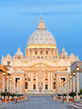 St. Peter's Basilica dome in Vatican City at sunset.