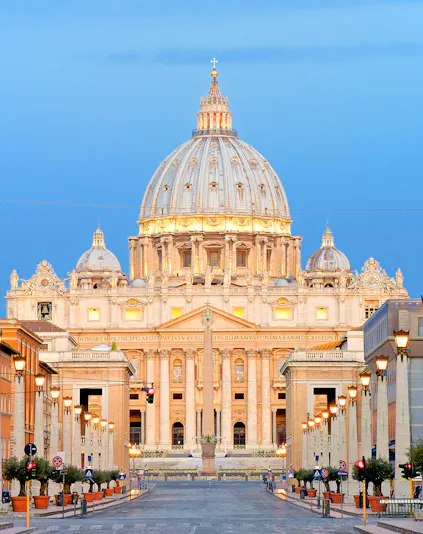 St. Peter's Basilica dome in Vatican City at sunset.