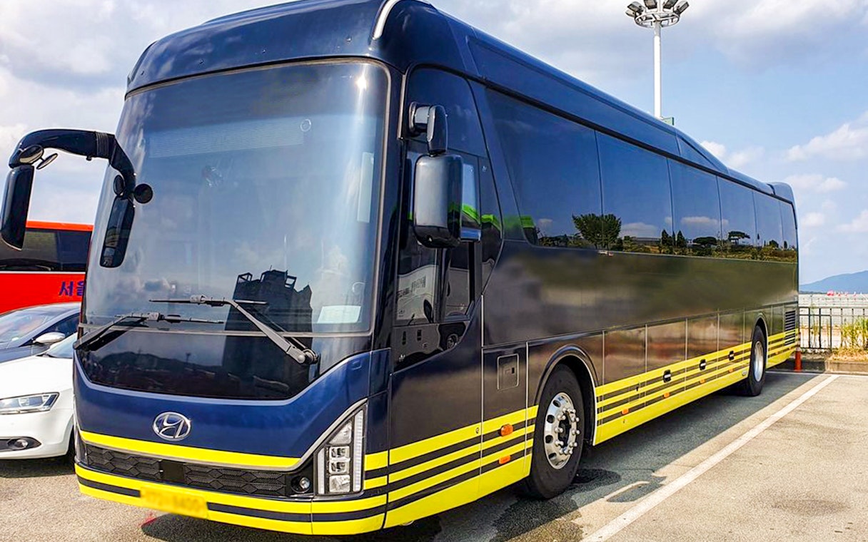 Tour bus for Nami Island Day Tour in Seoul parking area.