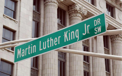 Martin Luther King Jr. Drive street sign in Atlanta, part of self-guided city exploration game.