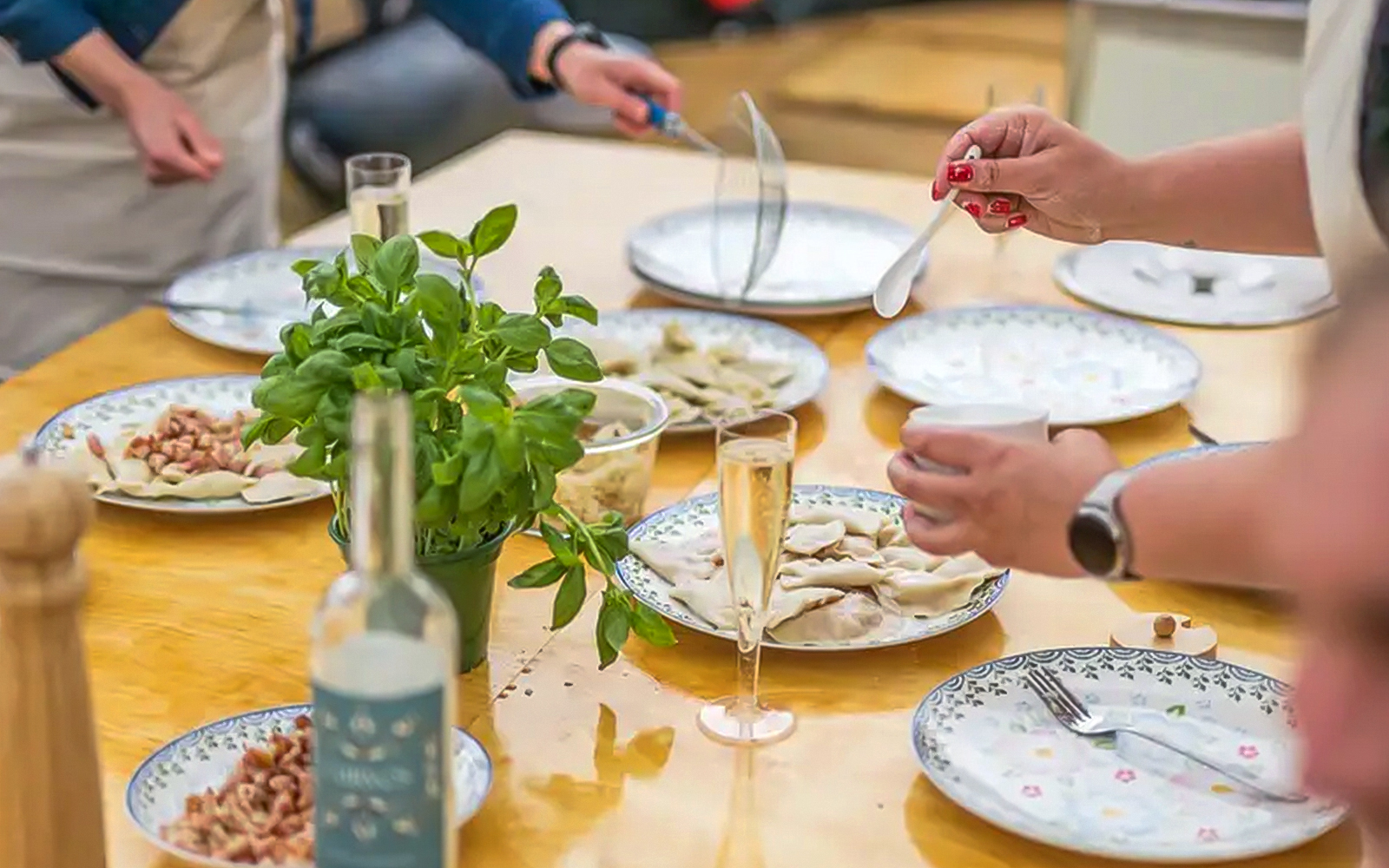Guests sampling pierogi on Motława River Cruise in Gdansk.
