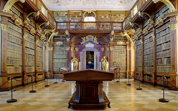 Baroque library interior in Melk Abbey, part of a day trip to Danube Valley from Vienna.