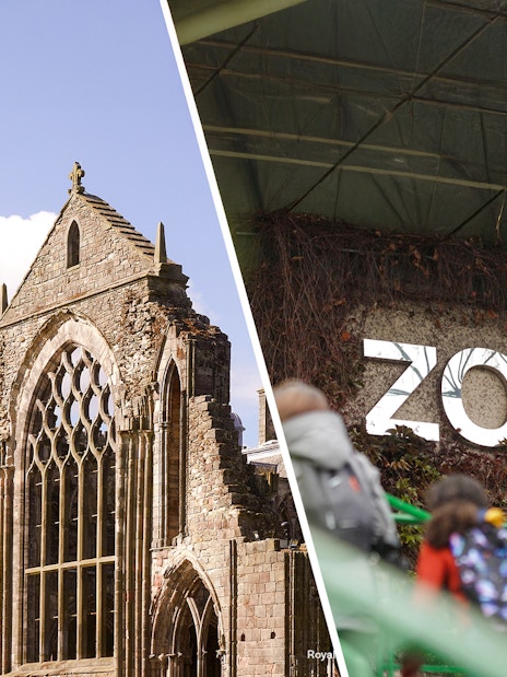 Holyrood Abbey ruins with arched windows at the Palace of Holyroodhouse, Edinburgh.