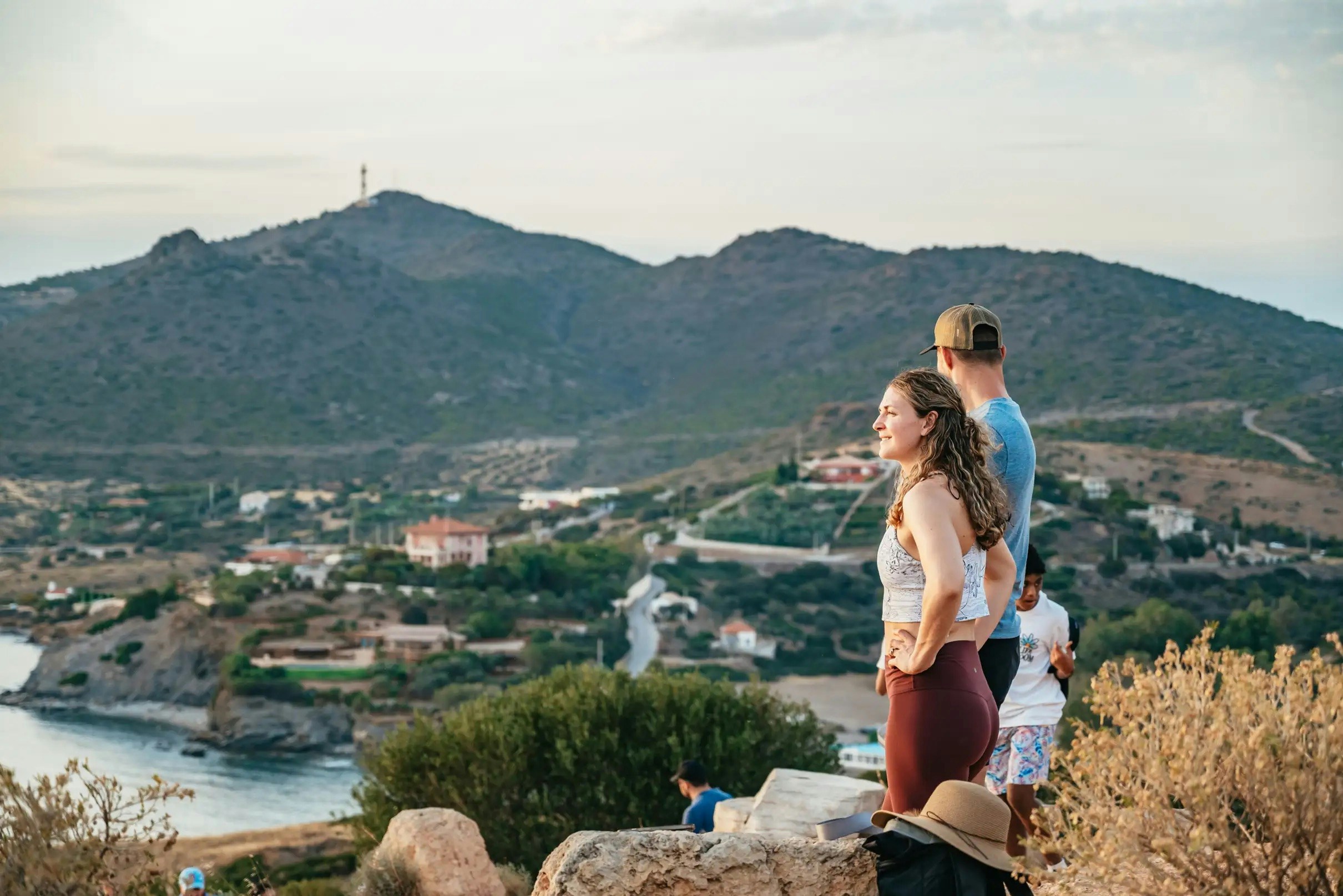 Visitors enjoying the view at Cape Sounion during the Temple of Poseidon tour.