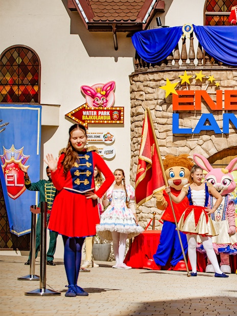 Welcome parade with performers and mascots at Energylandia Theme Park, Zator, near Krakow, Poland.