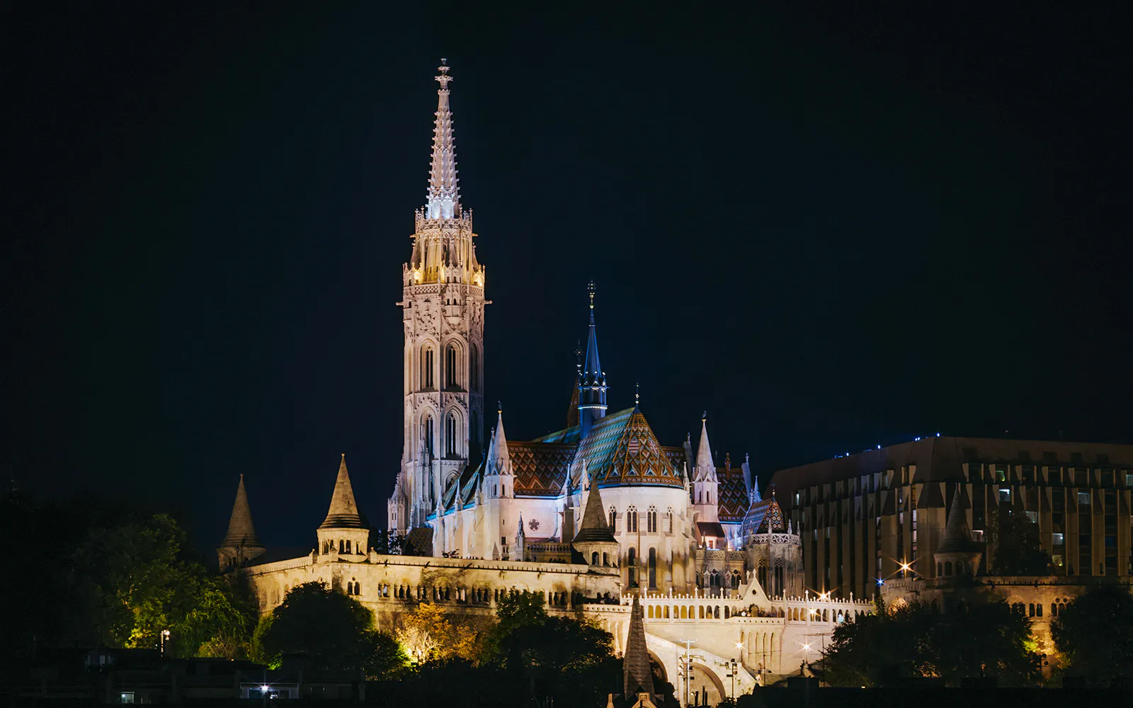 St. Matthias Church illuminated at night in Budapest, Hungary.