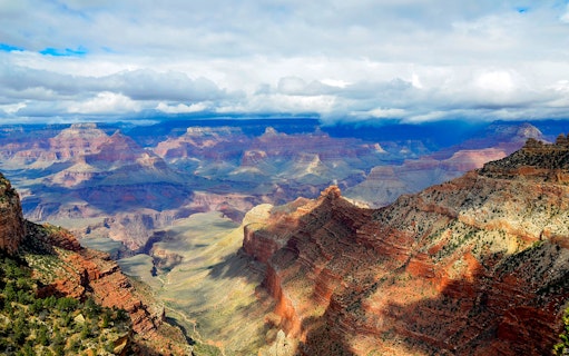 Grand Canyon view with layered rock formations on the Grand Kingdom Hummer Tour.
