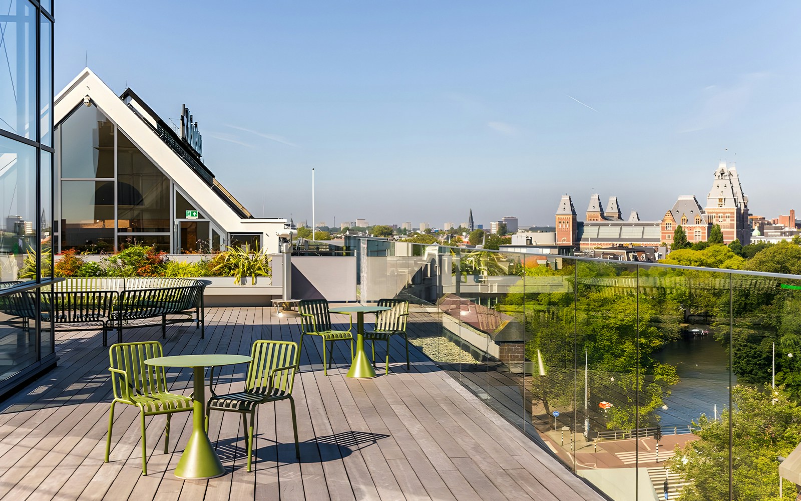 Rooftop view from Heineken Experience in Amsterdam with cityscape and canal.