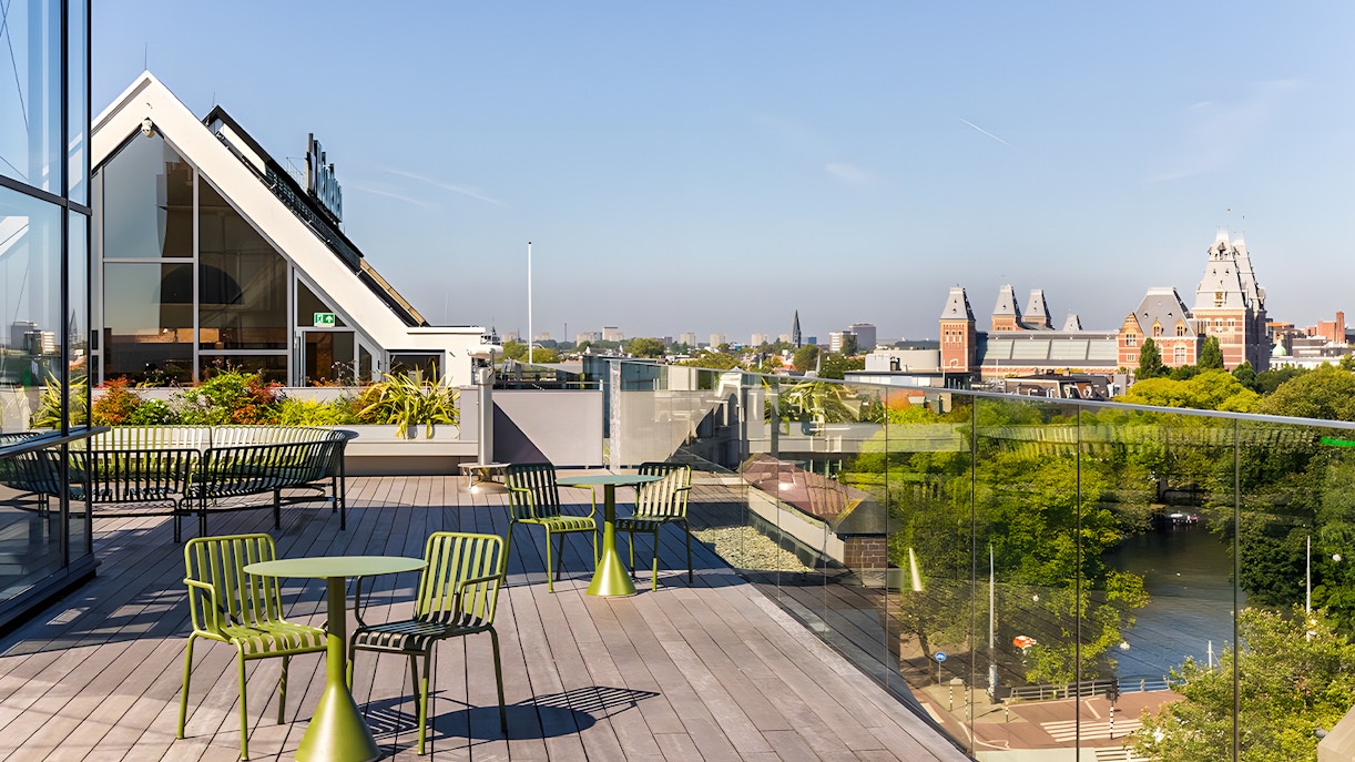 Heineken Experience rooftop view in Amsterdam with city skyline.
