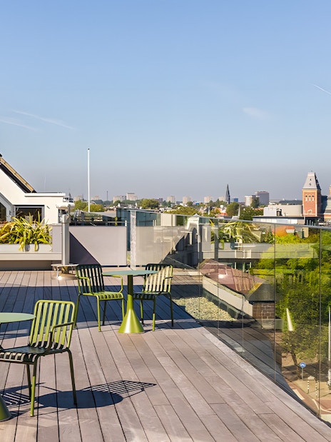 Rooftop view from Heineken Experience in Amsterdam with cityscape and canal.