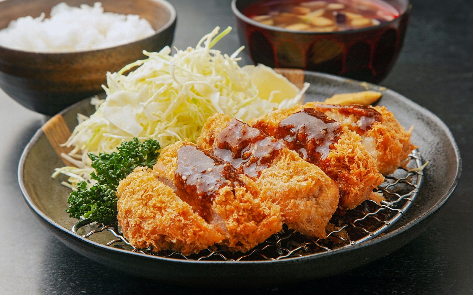 Tonkatsu with cabbage and sauce at a Japanese restaurant.
