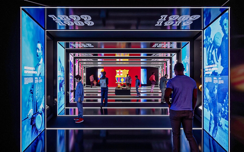 FC Barcelona museum exhibit with historical displays and visitors exploring.