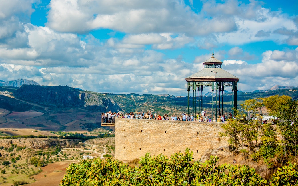 Gazebo at Alameda del Tajo park overlooking El Tajo gorge and Serranía de Ronda mountains, Ronda, Spain.