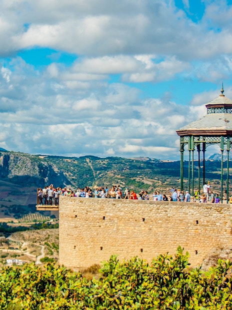 Gazebo at Alameda del Tajo park overlooking El Tajo gorge and Serranía de Ronda mountains, Ronda, Spain.