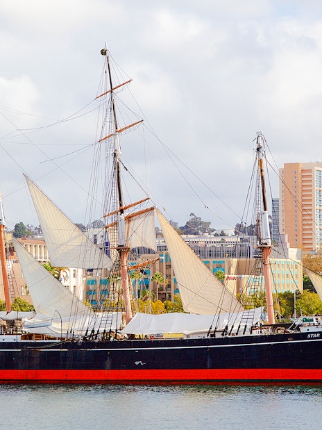 Historic sailing ship Star of India docked in San Diego harbor.