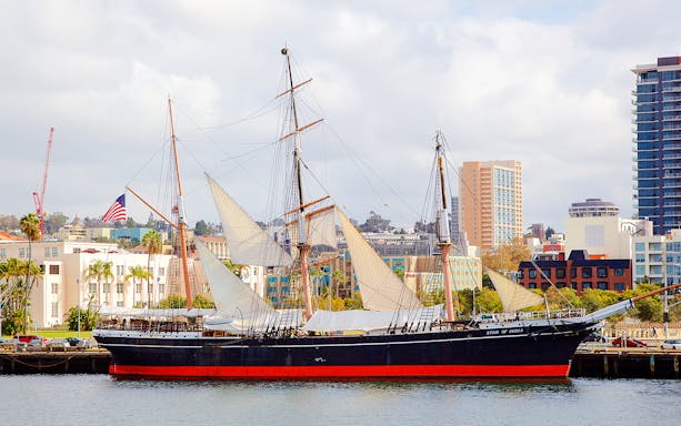 Historic sailing ship Star of India docked in San Diego harbor.
