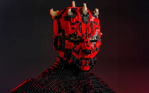 LEGO sculpture of a Star Wars character with red and black bricks at the exhibition.