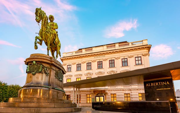 Albertina Museum entrance with equestrian statue in Vienna, Austria.