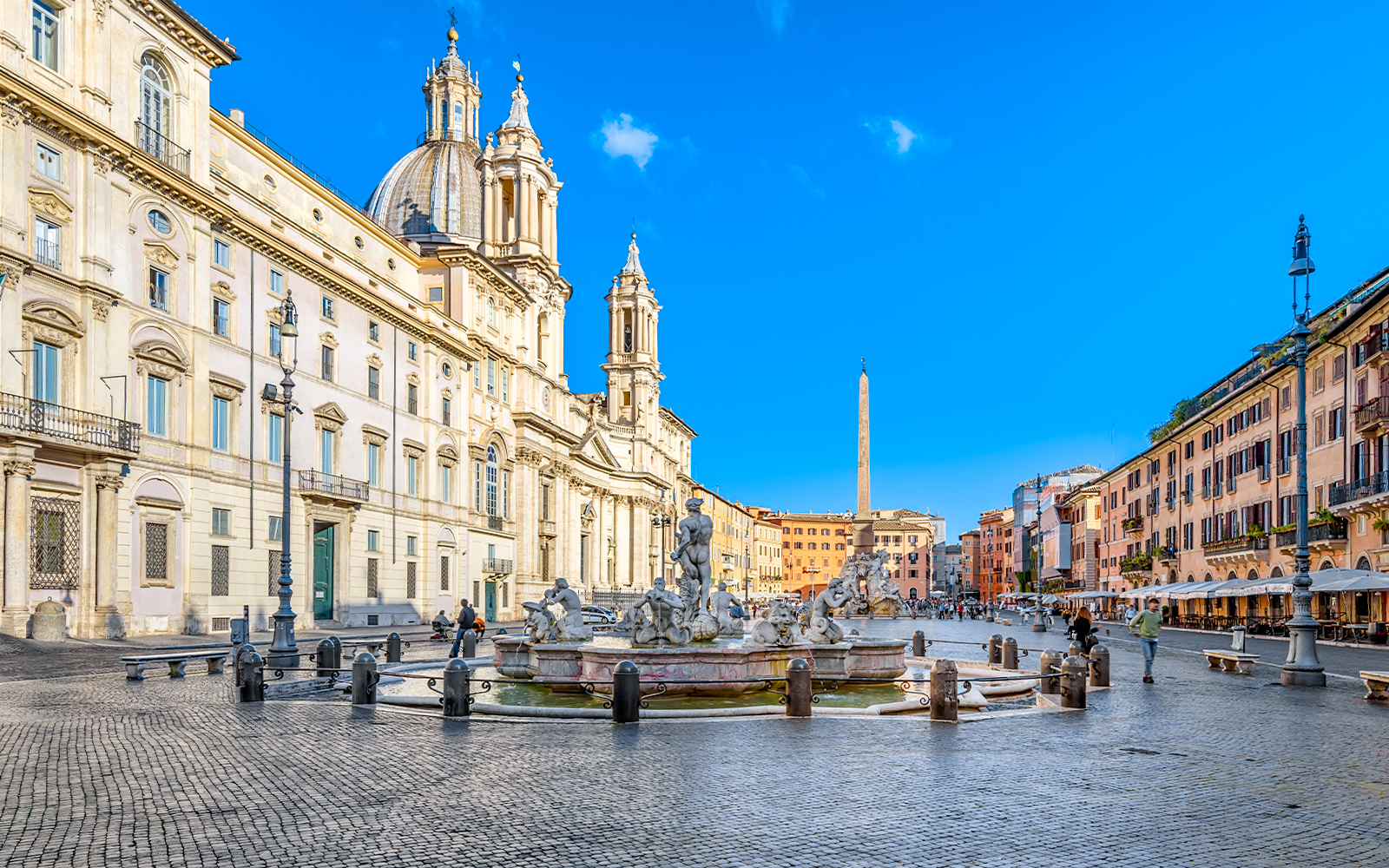 Piazza Navona in Rome featuring the Fountain of Neptune and surrounding architecture.