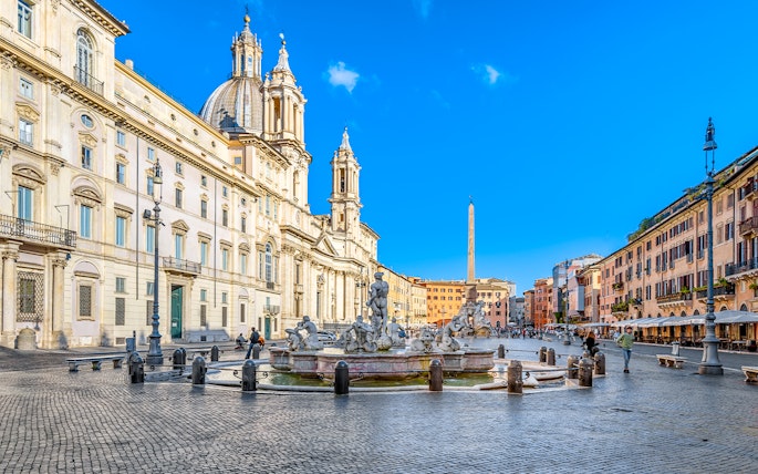 Piazza Navona in Rome featuring the Fountain of Neptune and surrounding architecture.