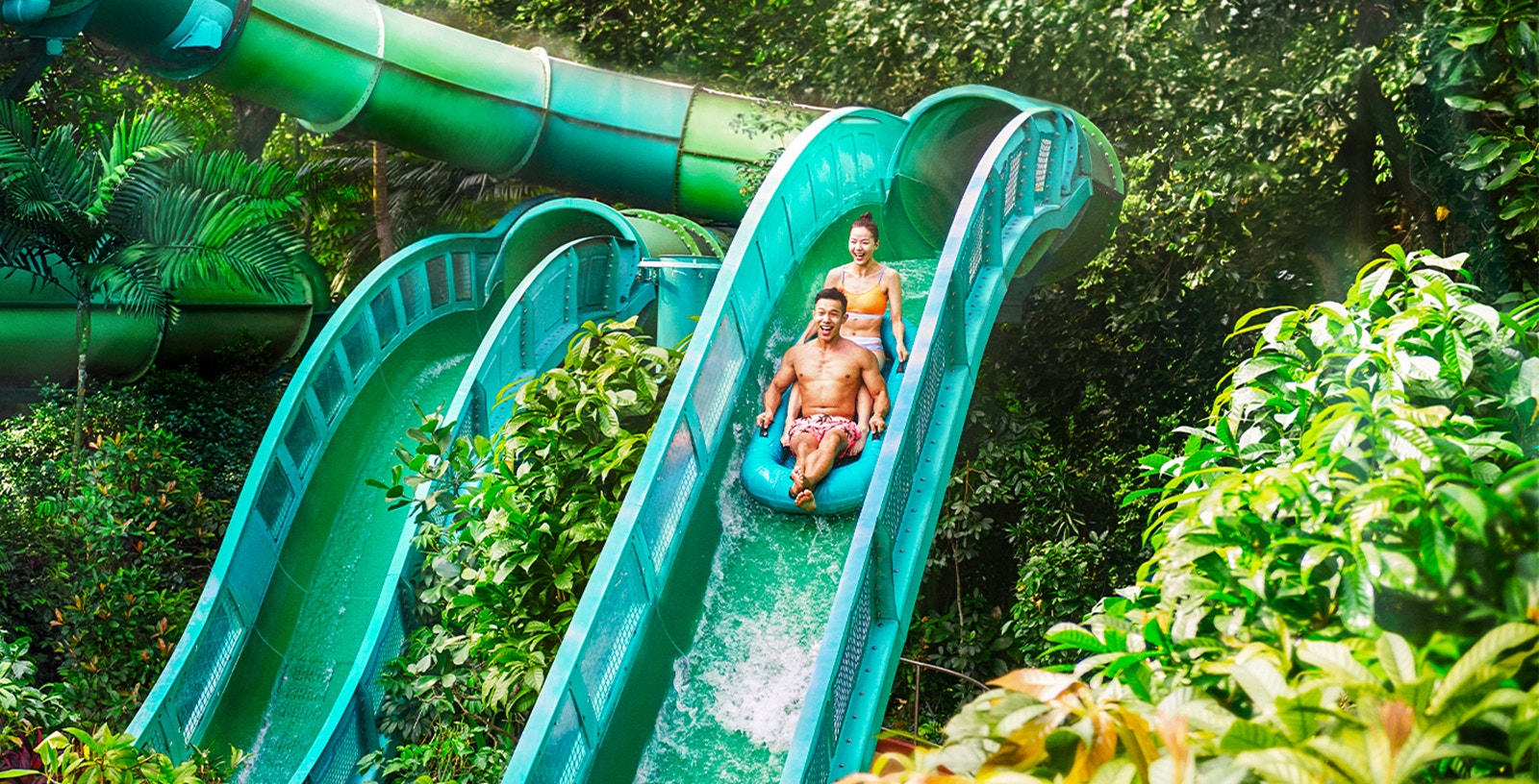 People enjoying the Riptide Rocket ride at Adventure Cove Waterpark, Singapore.