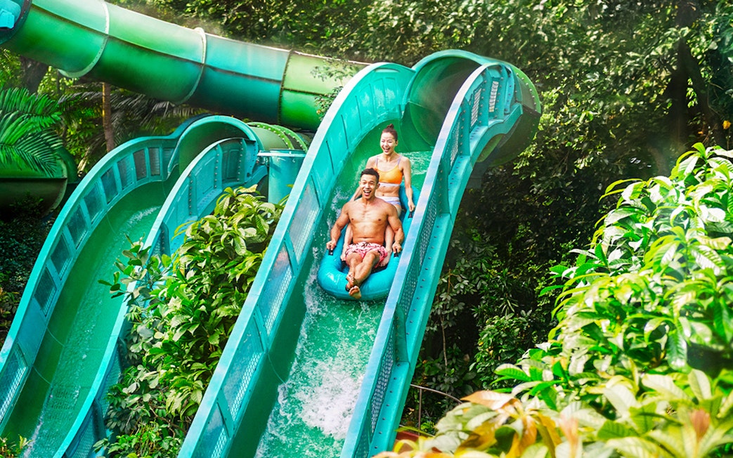 People enjoying the Riptide Rocket ride at Adventure Cove Waterpark, Singapore.