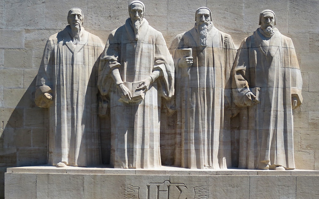 Reformation Wall statues in Geneva, part of the Full-Day Guided Tour of Lake Geneva.