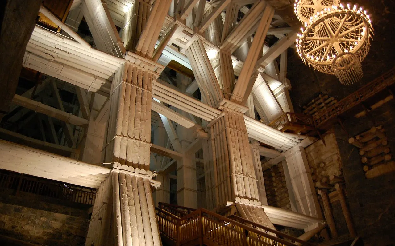 Wieliczka Salt Mine wooden structure and chandelier during guided tour from Krakow.