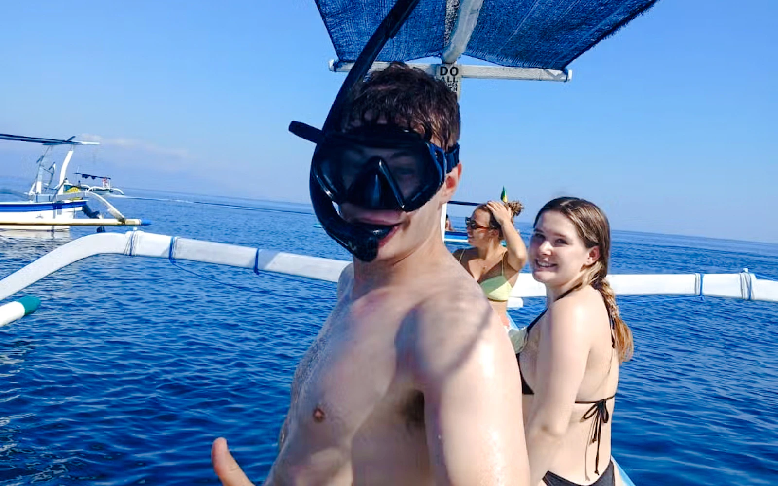 From Central Bali: Private Lovina Dolphin-Watching Boat Tour including Swimming with Dolphins and Snorkeling Image 7