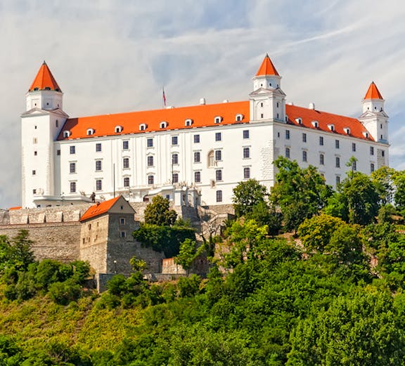 Bratislava Castle on a hill surrounded by greenery, Bratislava, Slovakia.