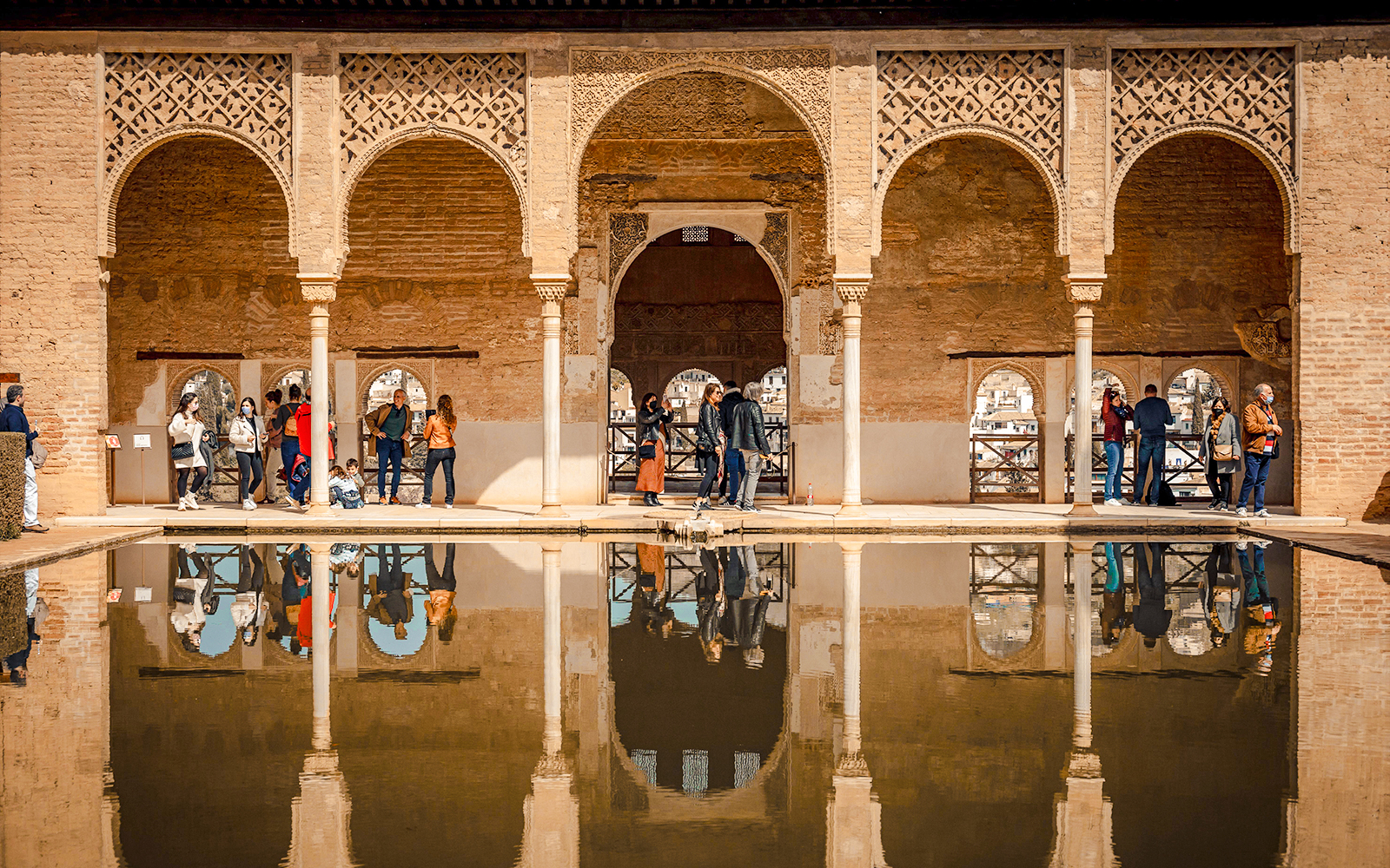 Palacio del Partal arches and reflection in Alhambra, Granada, Spain.