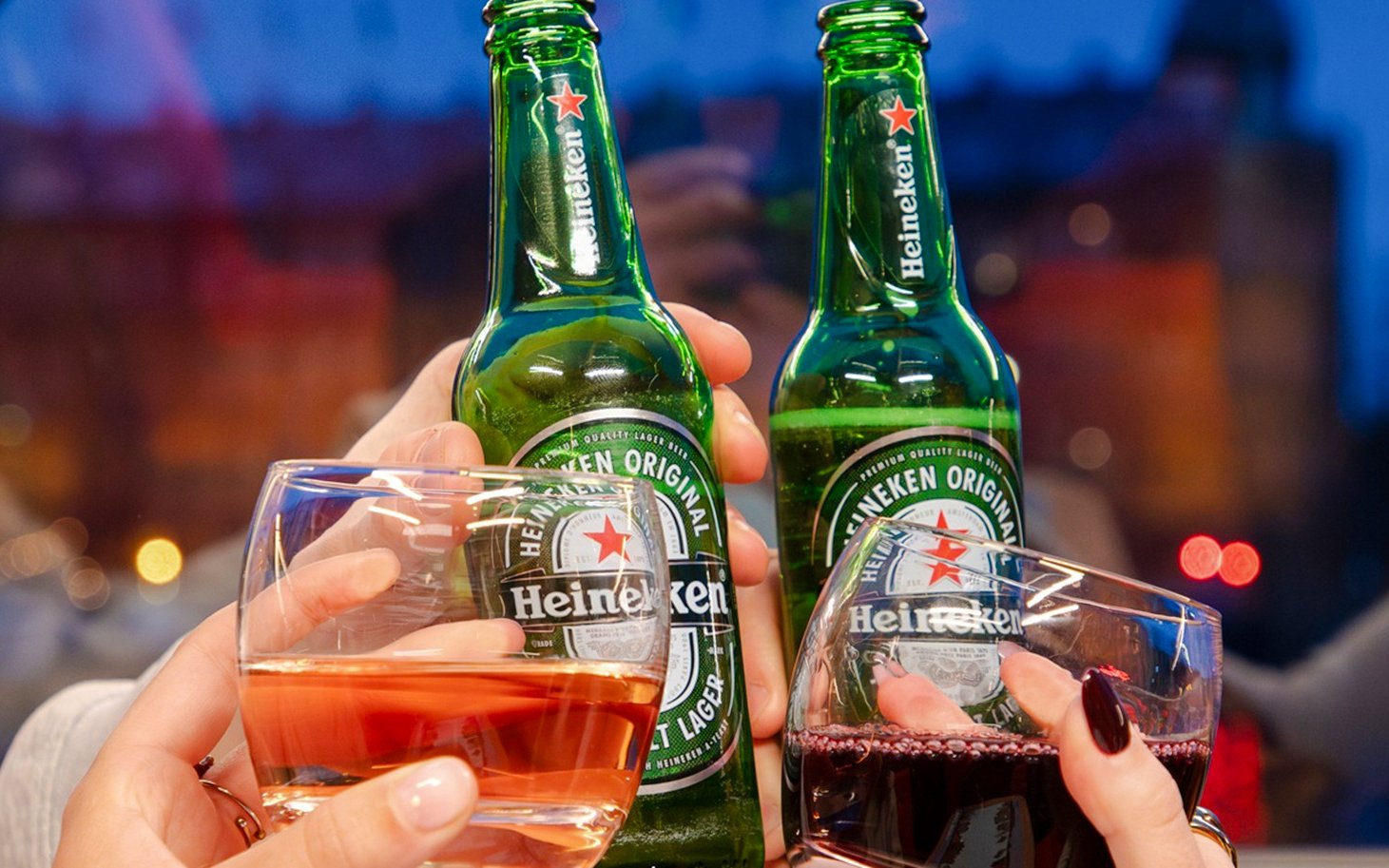 Guests enjoying drinks on the Lovers Canal Cruise in Amsterdam.