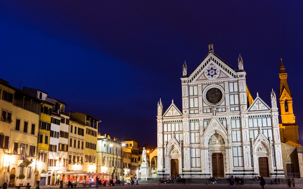 Santa Croce Basilica illuminated at night, Florence, Italy, seen during E-Bike Night Tour.