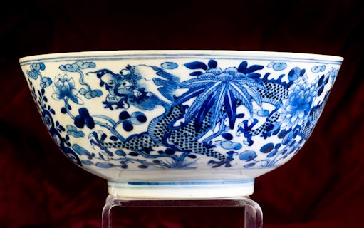 Blue and white porcelain bowl with dragon motif at Asian Civilisations Museum.