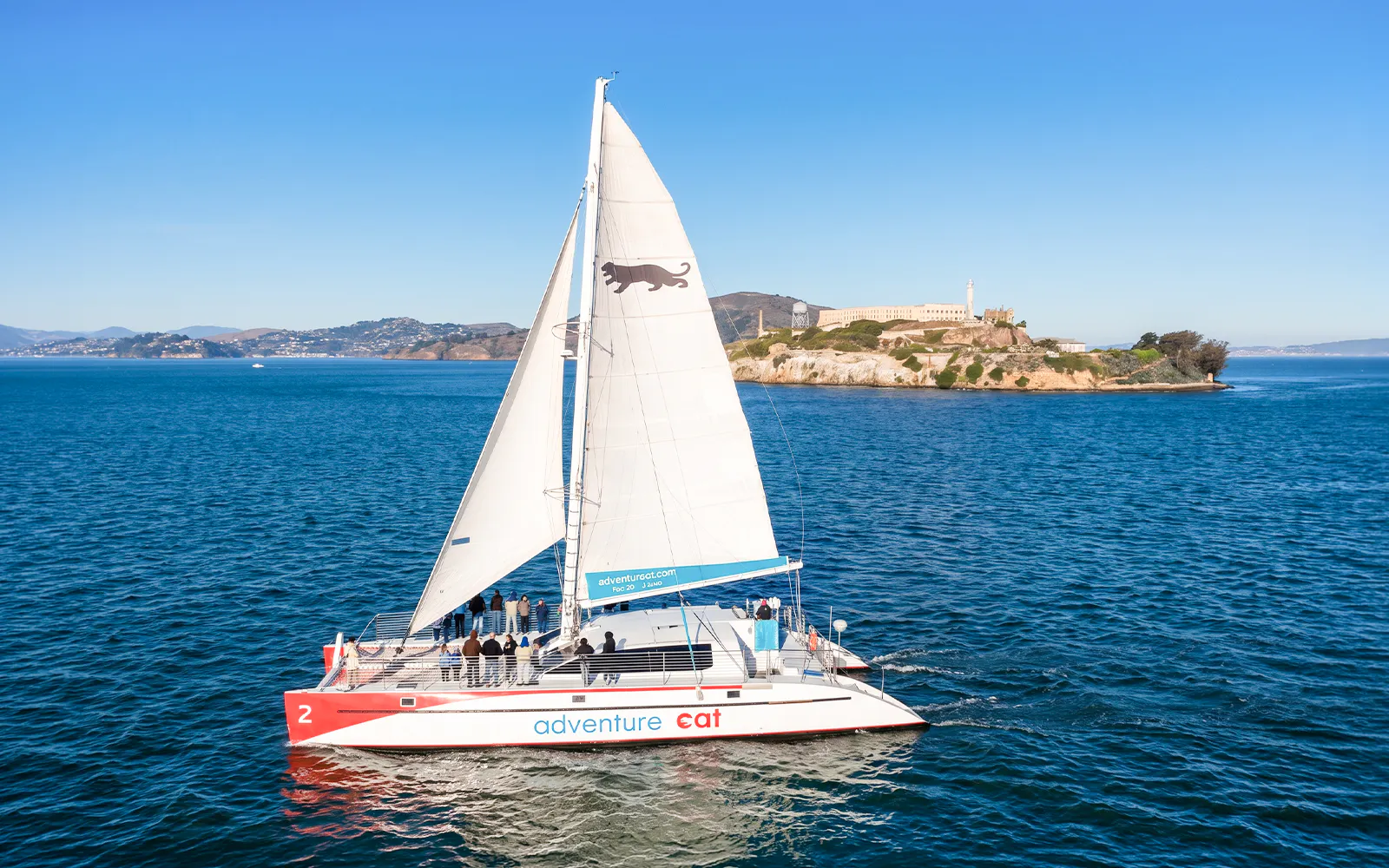 Sailboat cruising near Alcatraz Island in San Francisco Bay.