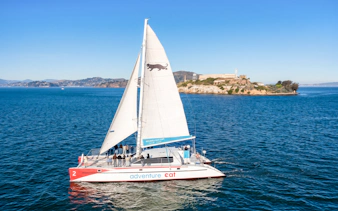 Sailboat cruising near Alcatraz Island in San Francisco Bay.