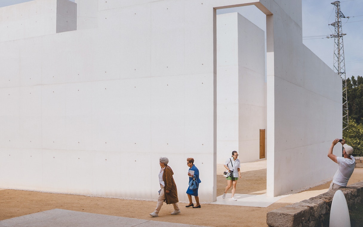 Visitors exploring the modern architecture of Lello Foundation Museum.