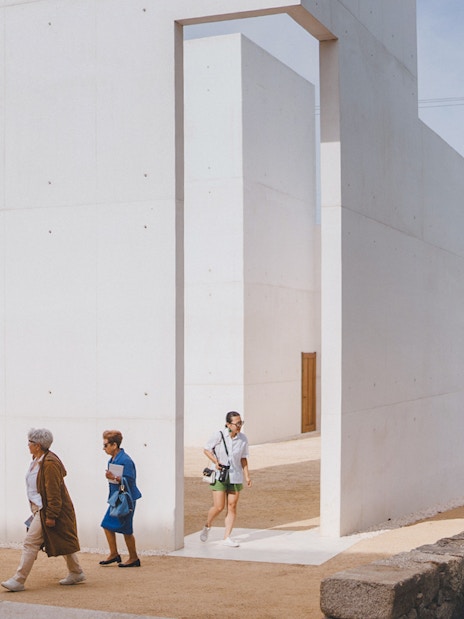 Visitors exploring the modern architecture of Lello Foundation Museum.