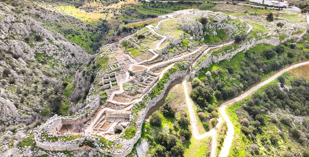 Aerial view of the ancient citadel of Mycenae with ruins and pathways, Argolida, Greece.
