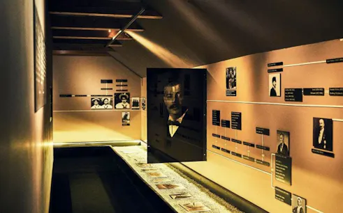 Franz Kafka Museum exhibit with timeline and historical photographs.