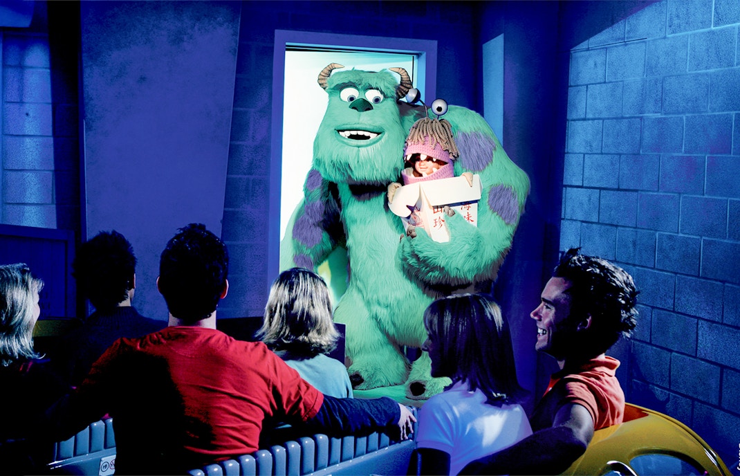 Guests on the Monster's Inc. ride at Disneyland Adventure Park California see Sulley holding Boo.