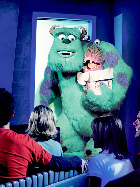 Guests on the Monster's Inc. ride at Disneyland Adventure Park California see Sulley holding Boo.