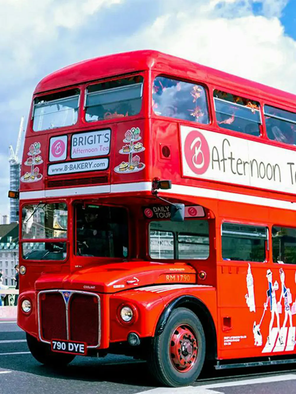 Red double-decker bus for afternoon tea tour in London.