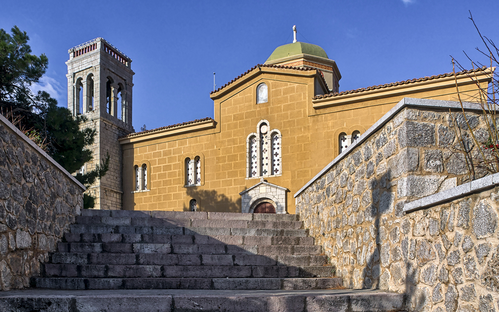 Saint George Church with stone steps in Arachova, Greece.